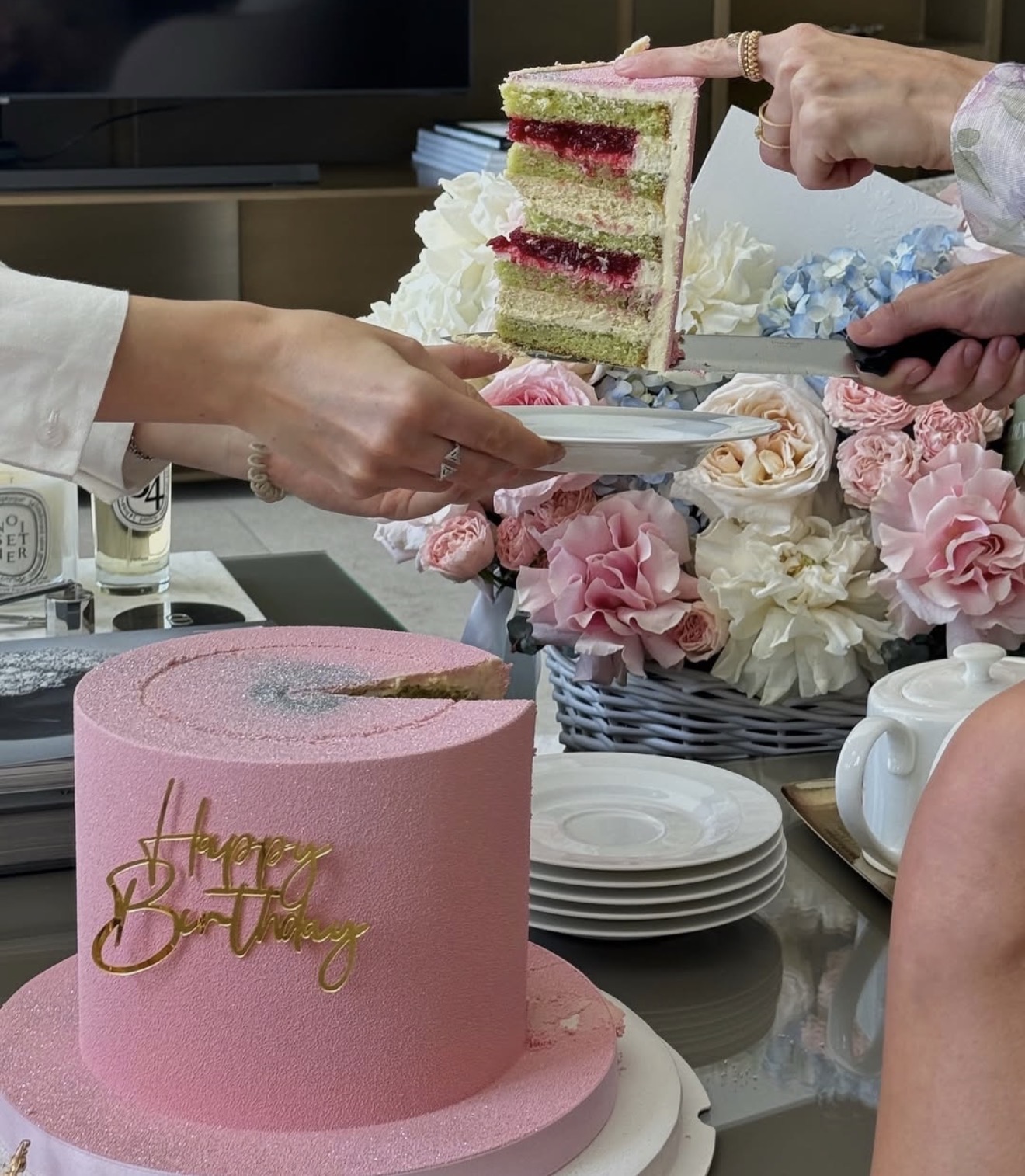 Pauline Cake Dubai birthday cake being cut and served